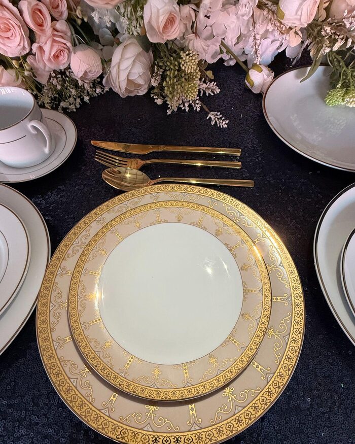Gold filigree place setting